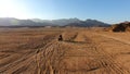 Race on the ATV in the desert