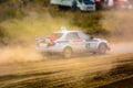 Race car on a dusty road Royalty Free Stock Photo