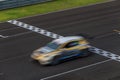 Race car racing on speed track Royalty Free Stock Photo