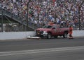 Race Crew Members cleaning Debris after Tony Kanaan's Car Crash