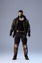 Race cyberpunk player in mask standing