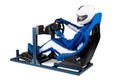 Race driver in blue overall with helmet taining on simracing aluminum simulator rig for video game racing. Motorsport car bucket Royalty Free Stock Photo