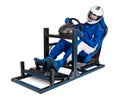 Race driver in blue overall with helmet training on simracing aluminum simulator rig for video game racing. Motorsport car bucket