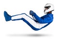 Race driver in blue white motorsport overall hover over ground in driving seat position with shoes gloves and safety crash helmet