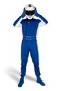 Race driver in blue white motorsport overall shoes gloves and safety gear take off crash helmet after finish isolated white
