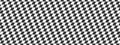 Race flag texture in diagonal arrangement. Tilted checkered black and white squares background. Sport car competition Royalty Free Stock Photo