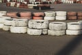 Race track safety barrier. asphalt racing track with red and white tires. colorful tires stack. karting racetrack Royalty Free Stock Photo