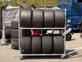 Race tyres are stalled behind the pitlane during a race