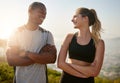 Race you. a fit young couple working out together outdoors. Royalty Free Stock Photo