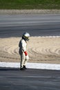 Racecar driver walking Royalty Free Stock Photo