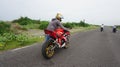 racer red motorcycle 250cc on the road Royalty Free Stock Photo