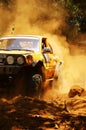 Racer at terrain racing car competition Royalty Free Stock Photo