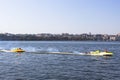 Races of water-motor fireballs on the lake Royalty Free Stock Photo