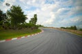 Racetrack straight, road to the mountain with the clear sky.