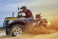 Racing ATV is sand. Royalty Free Stock Photo