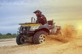 Racing ATV is sand. Royalty Free Stock Photo