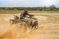 Racing ATV is sand. Royalty Free Stock Photo