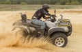 Racing ATV is sand. Royalty Free Stock Photo