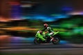 Racing bike rider racing at high speed Royalty Free Stock Photo