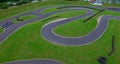 Racing bikes track with green gross