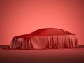 Racing car covered with red cloth Royalty Free Stock Photo