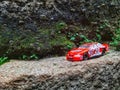 A racing car is driving through a valley Royalty Free Stock Photo