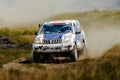 racing car high speed moving on dusty road Royalty Free Stock Photo