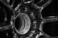 Racing car wheel rim bolt extrem closeup Royalty Free Stock Photo