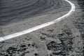 Racing curve. Remains of rubbed rubber on the asphalt of the race track