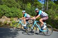 Racing Cyclist Looking At Teammate