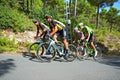 Racing Cyclists On A Hill Royalty Free Stock Photo