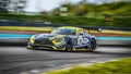 Racing driver Josef Kluber driving a Mercedes AMG GT3 Royalty Free Stock Photo