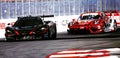 Racing final lap of McLaren and Porsche in the corner action Royalty Free Stock Photo