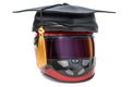 Racing helmet with graduation cap. Racing school concept, 3D rendering