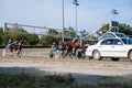 Racing horses trots on the track of stadium trotting horse racing competition