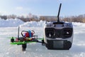 Racing quadcopter on the snow Royalty Free Stock Photo