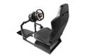 Racing simulator cockpit with seat and wheel Royalty Free Stock Photo