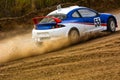 Racing speed car on a dusty road.