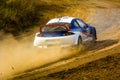 Racing speed car on a dusty road.