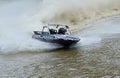 Racing speedboat competing at high speeds