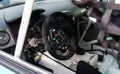 Racing touring car cockpit interior Renault name on steering wheel