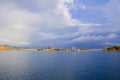 Racing yacht in the sea on blue sky background. Peaceful seascape. Beautiful blue sky over calm sea. Royalty Free Stock Photo