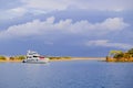 Racing yacht in the sea on blue sky background. Peaceful seascape. Beautiful blue sky over calm sea Royalty Free Stock Photo