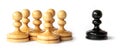 Racism between black and white pawns Royalty Free Stock Photo