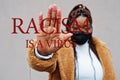 Racism is a virus. African american woman, wear black face mask show stop hand sign Royalty Free Stock Photo