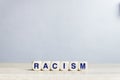 Racism - word from wooden blocks with letters