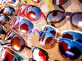 Rack with an assortment of sunglasses Royalty Free Stock Photo