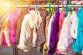 Rack of baby and children jackets displayed at outdoor hanger market for sale. Royalty Free Stock Photo