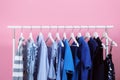 Rack with bright clothes Royalty Free Stock Photo