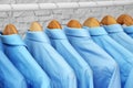 Rack with clean clothes on hangers after dry-cleaning Royalty Free Stock Photo